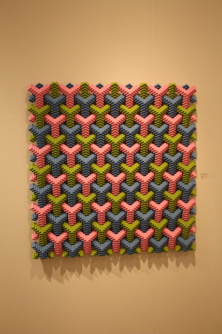 Three dimensional angles are accented by the varying color pattern.