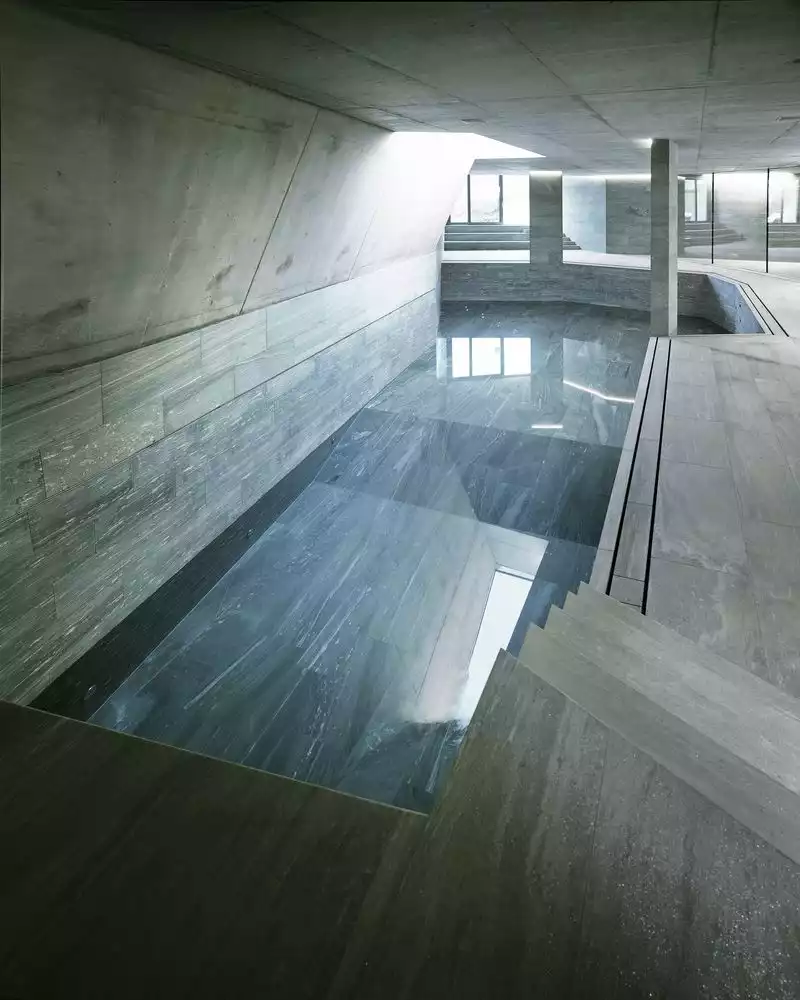 Concrete house with swimming pool indoor