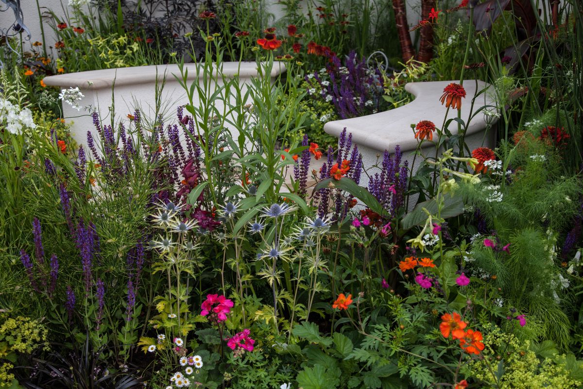 You can have the bench hidden in the garden between plants and bushes, like a secret door