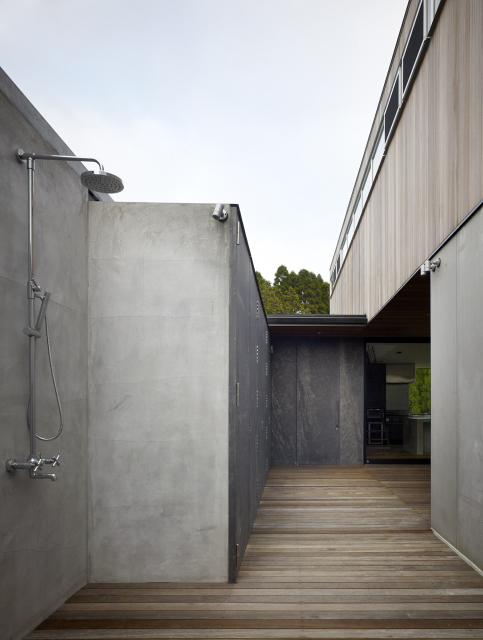 Concrete panels outdoor shower with deck floor