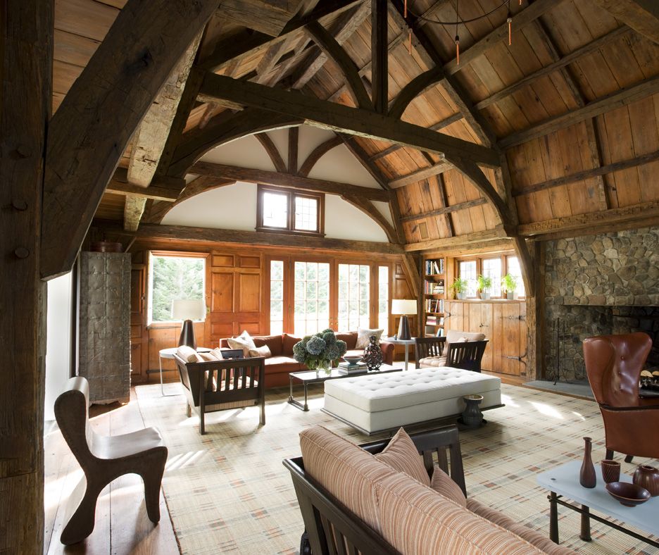 The soaring beamed ceiling of the home provides for a breathtaking living room design.