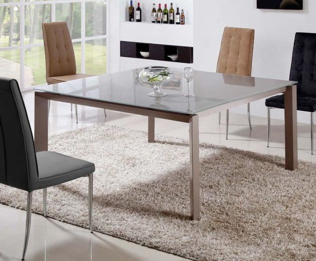 Contemporary dining table with glass on top