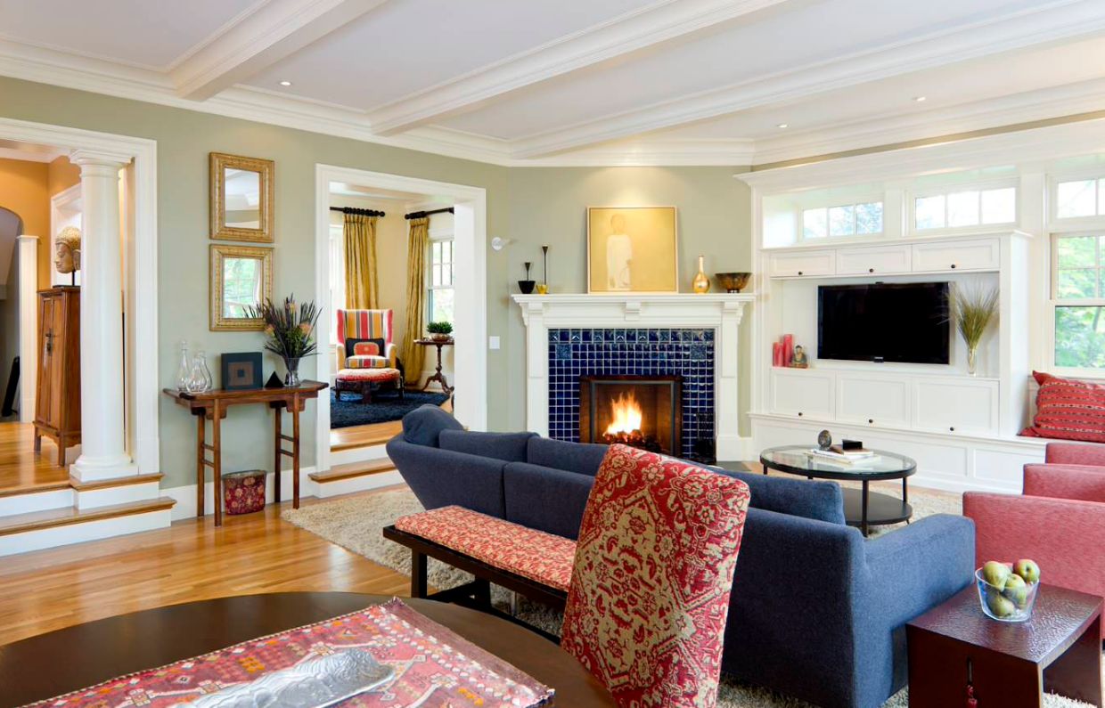 Corner fireplace with small blue ceramic tiles