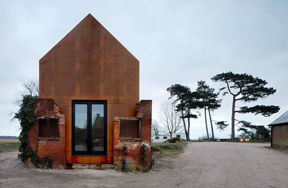 Corten dilapidated building on the Dovecote Studio