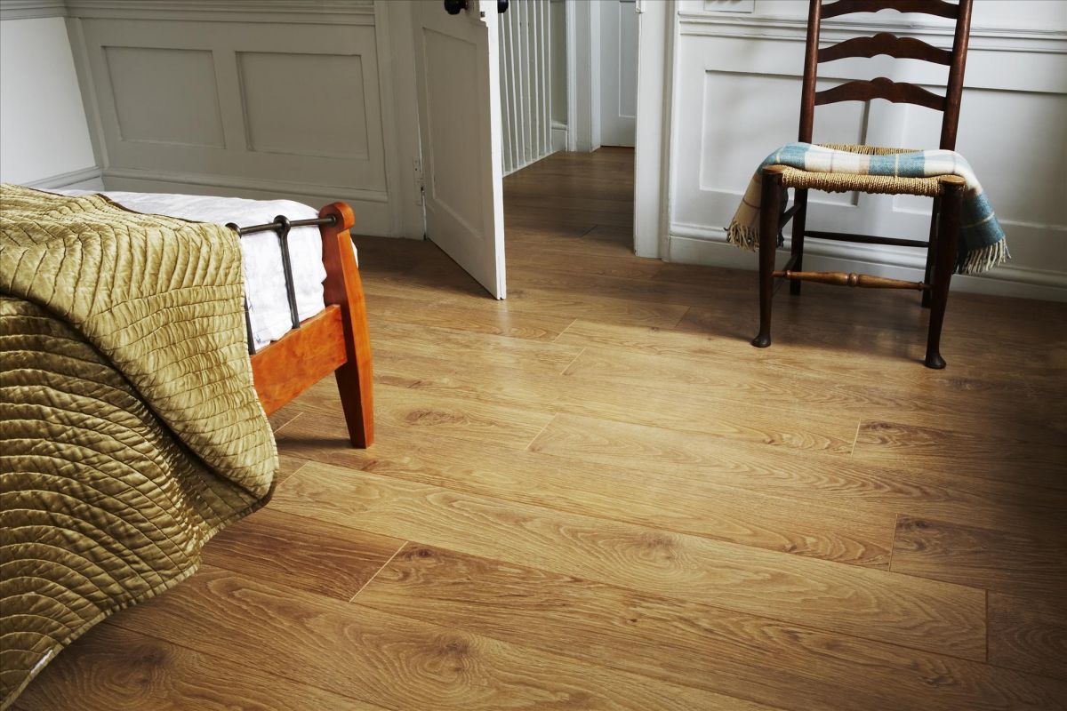 Cozy bedroom with laminate wood floor