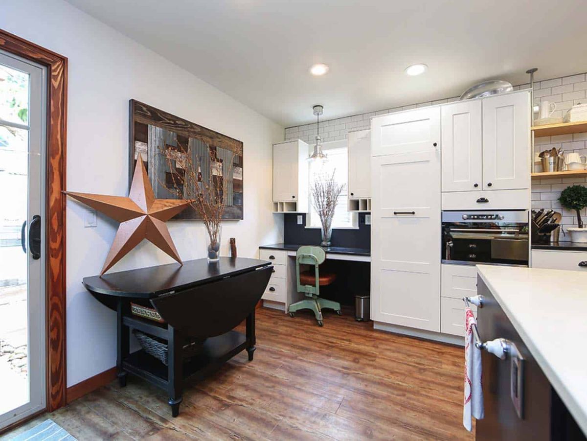 Craftsman house in San Clemente by Better Living SoCal white cabinets drop down leaf table