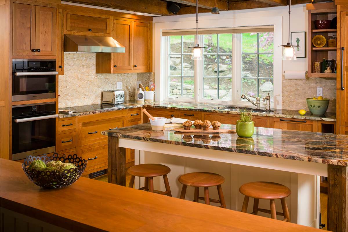 Craftsman kitchen wood cabinets cream backsplash