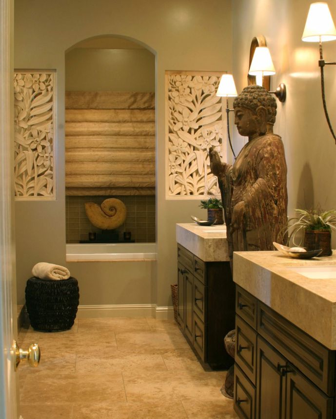 A full-size statue makes this bathroom feel like a spa.