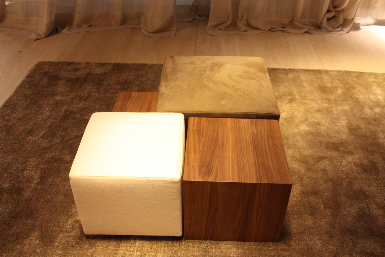 If you like the concept of mixed styles and materials, but your living space isn's so large, you can achieve the same thing on a smaller scale. Flex form also shows how to do this with smaller ottomans and cube tables of different sizes. Each piece can serve as seating or table space.