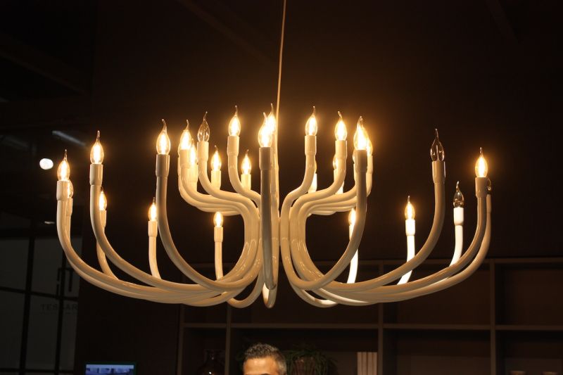 The many smooth, curved tubes remind us of the animal antler-style lighting fixtures popular for woodsy hide-aways.