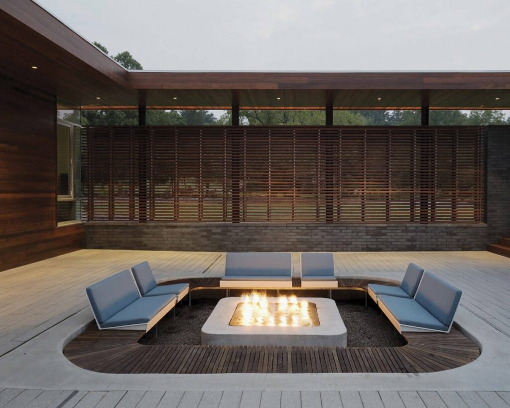 Curved House by Hufft Projects fire pit 1024x819