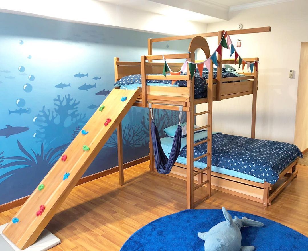 Custom bunk beds with the climbing platform