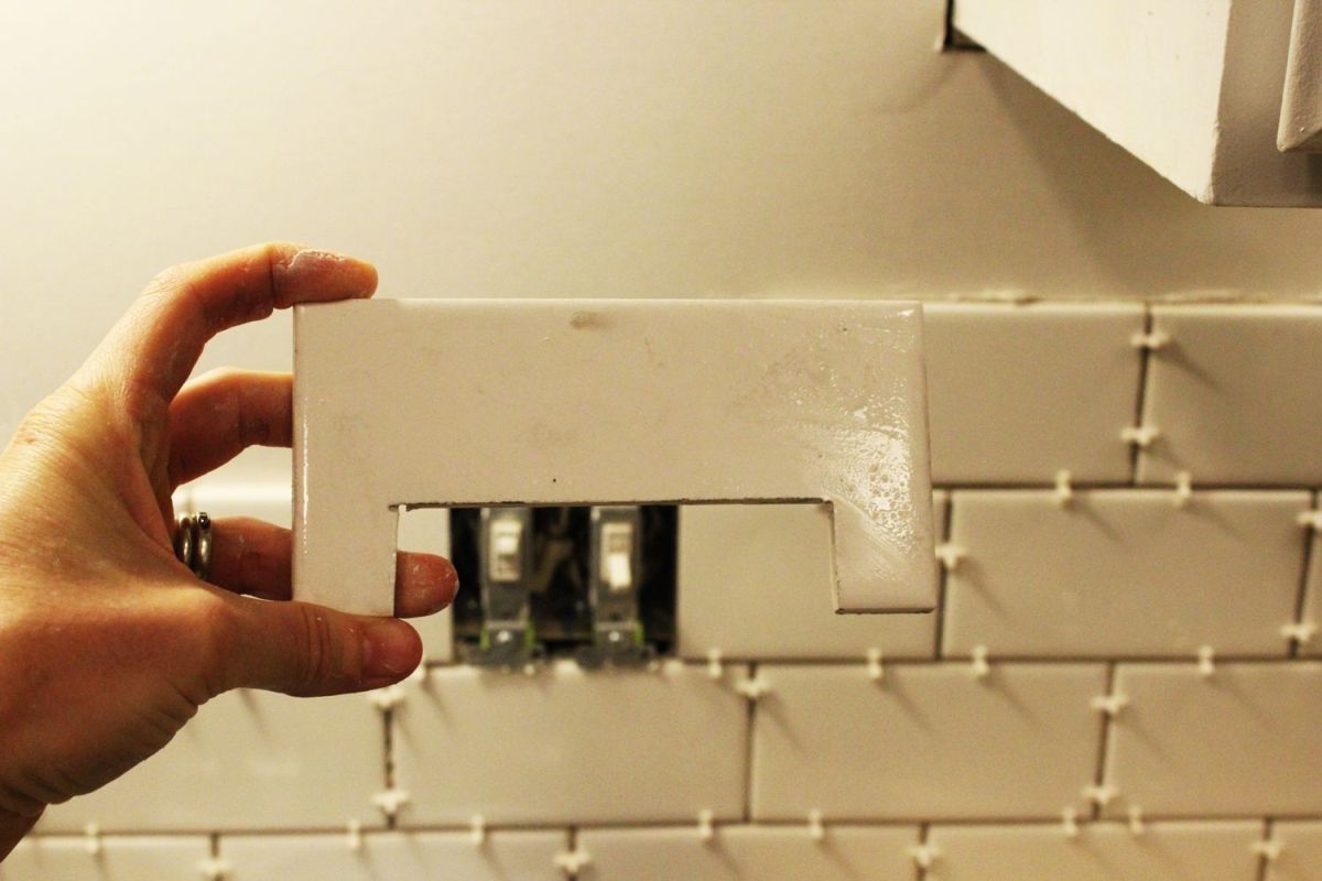 Cut the subway tile on center
