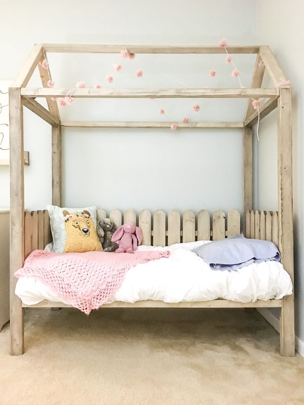 Cute house bed with wooden fence