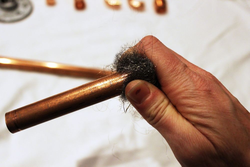 DIY Copper Paper Towel Holder steel wool to scuff