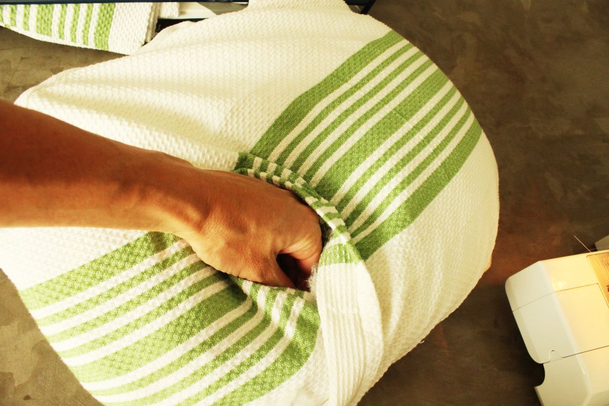 DIY Dish Towel Pillows Turn the pillow cover right side out