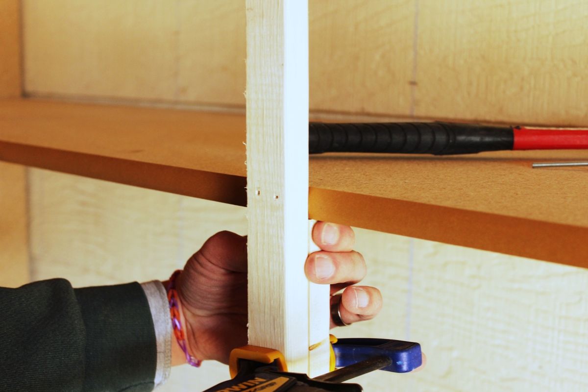 DIY Easy Built in Shelves front center furring strip into the front of the shelving