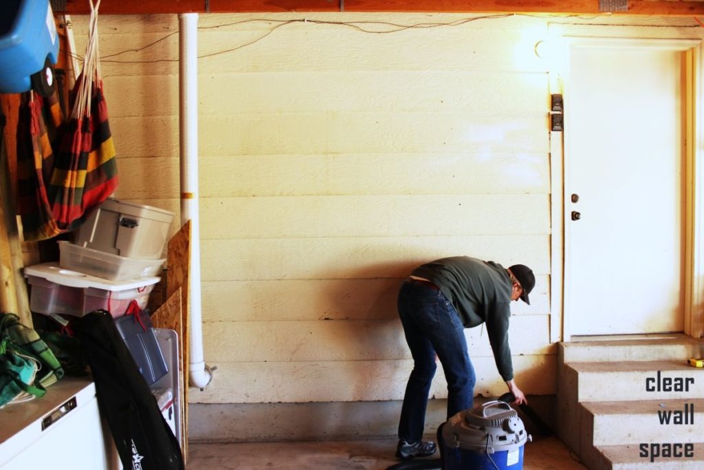 DIY Easy Built in Shelves start by clear the wall 1024x683