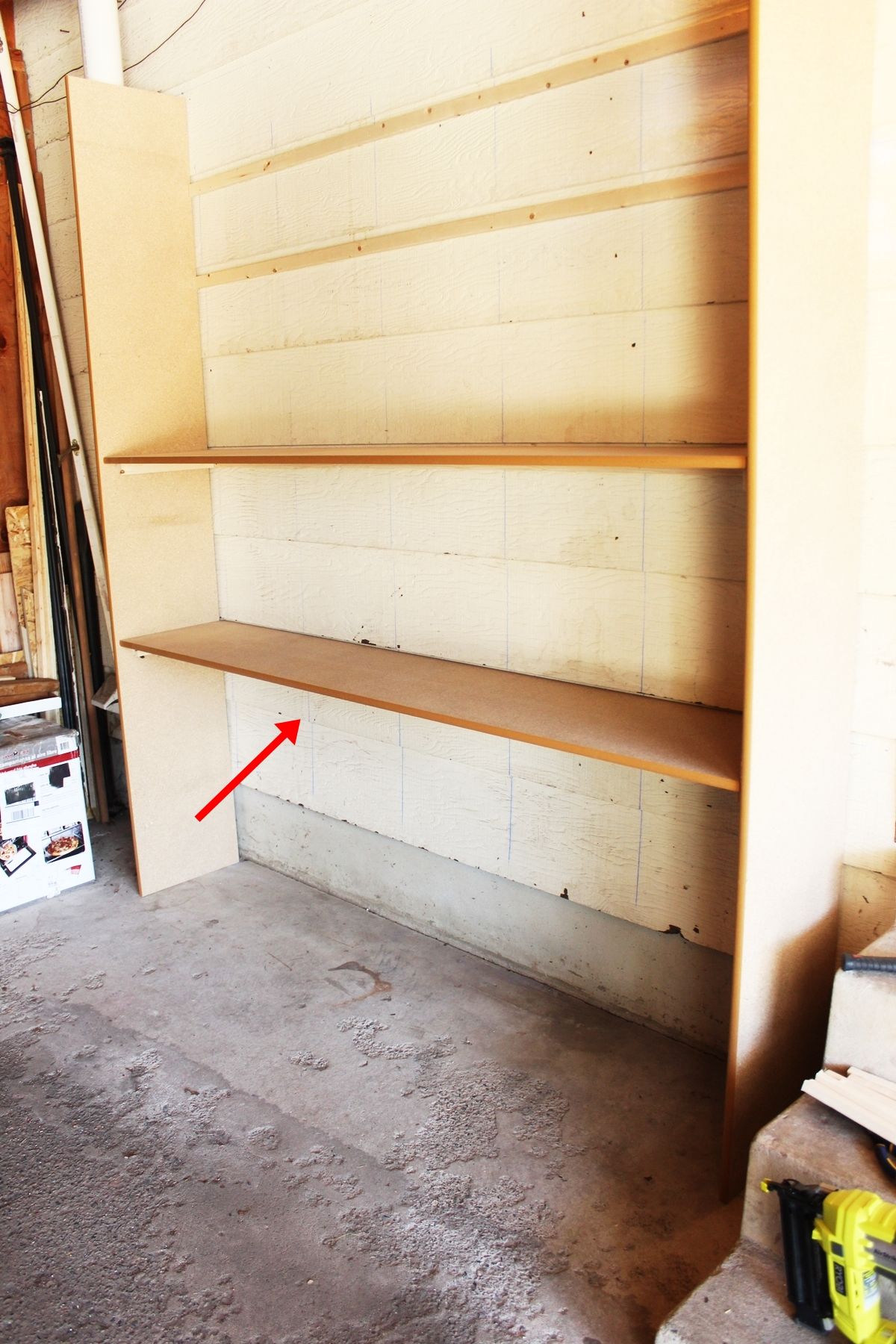 DIY Easy Built in Shelves started with your bottom shelf