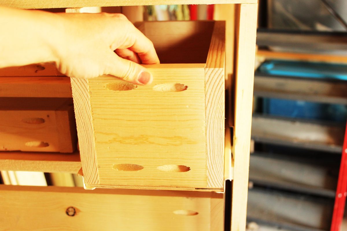 DIY Modern Wooden Dresser Roll the drawer into its rightful slot 