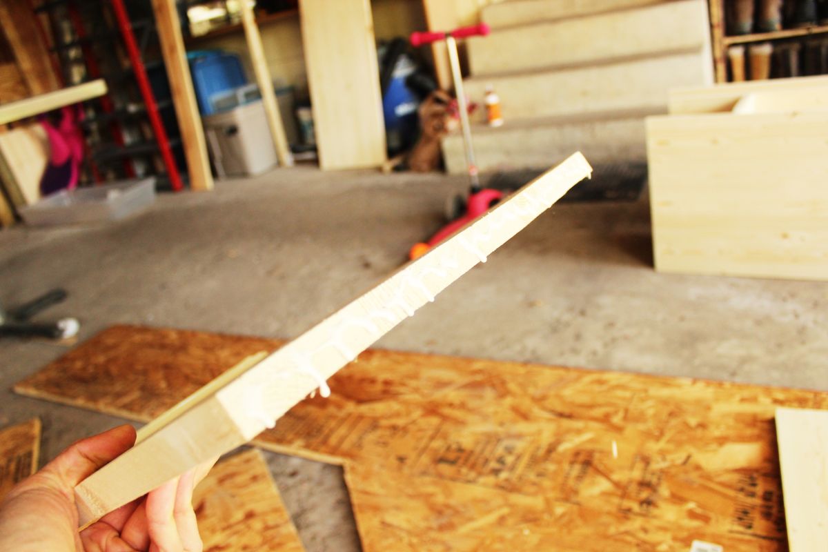 DIY Modern Wooden Dresser Run a bead of wood glue on the bottom edge of a side slab