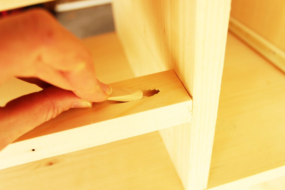 DIY Modern Wooden Dresser Slide the pocket hole plug into the hole 