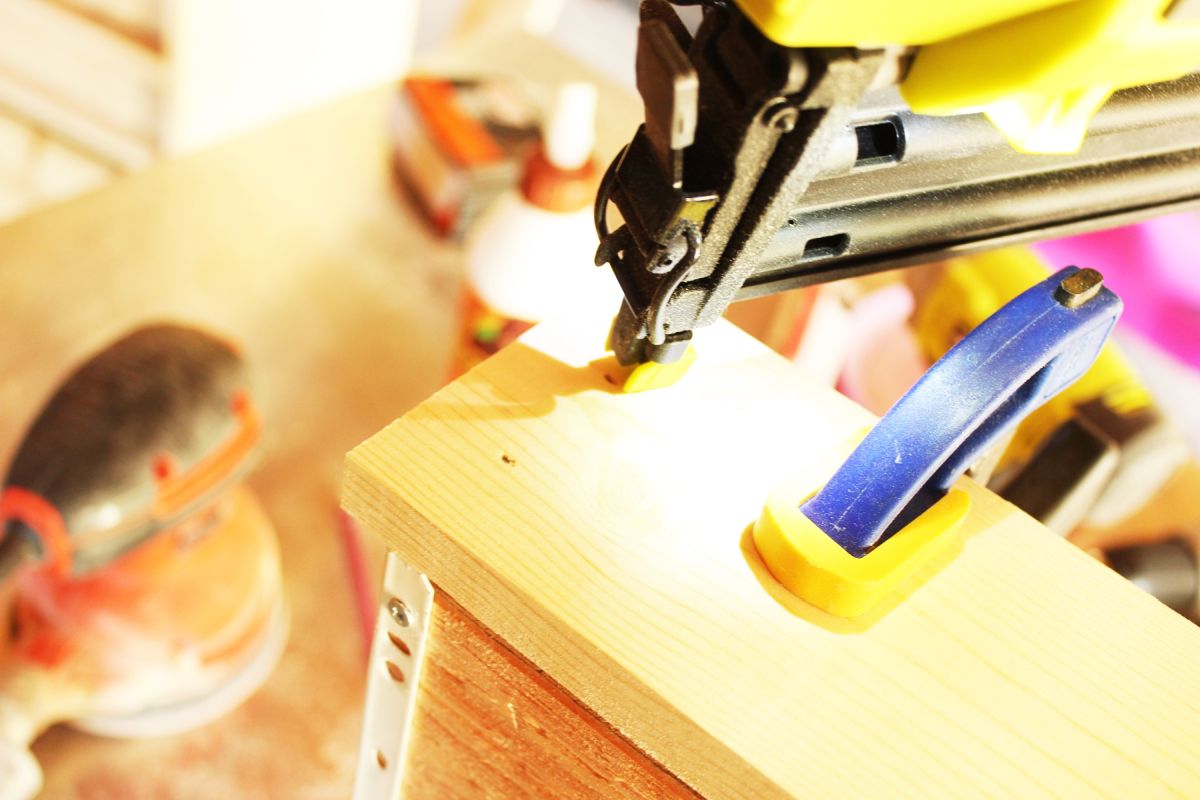 DIY Modern Wooden Dresser brad nails to attach the drawer