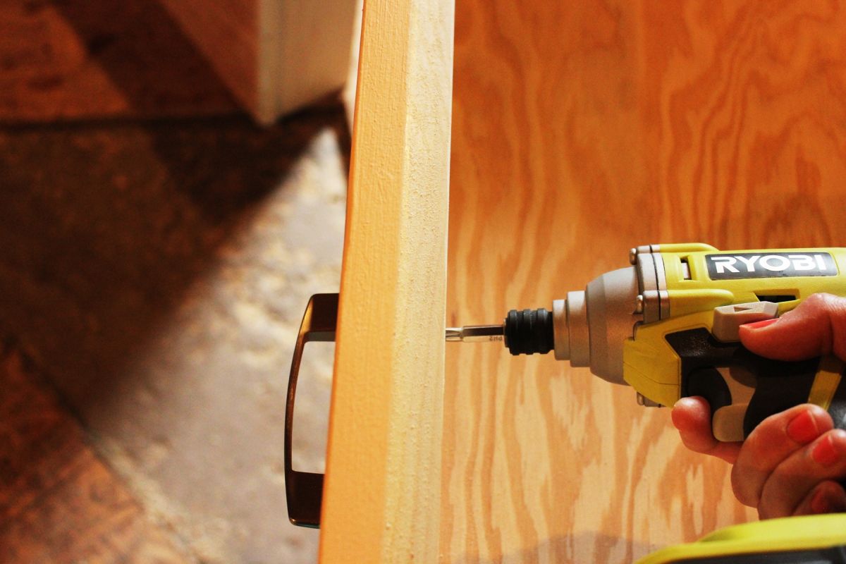 DIY Modern Wooden Dresser install knobs