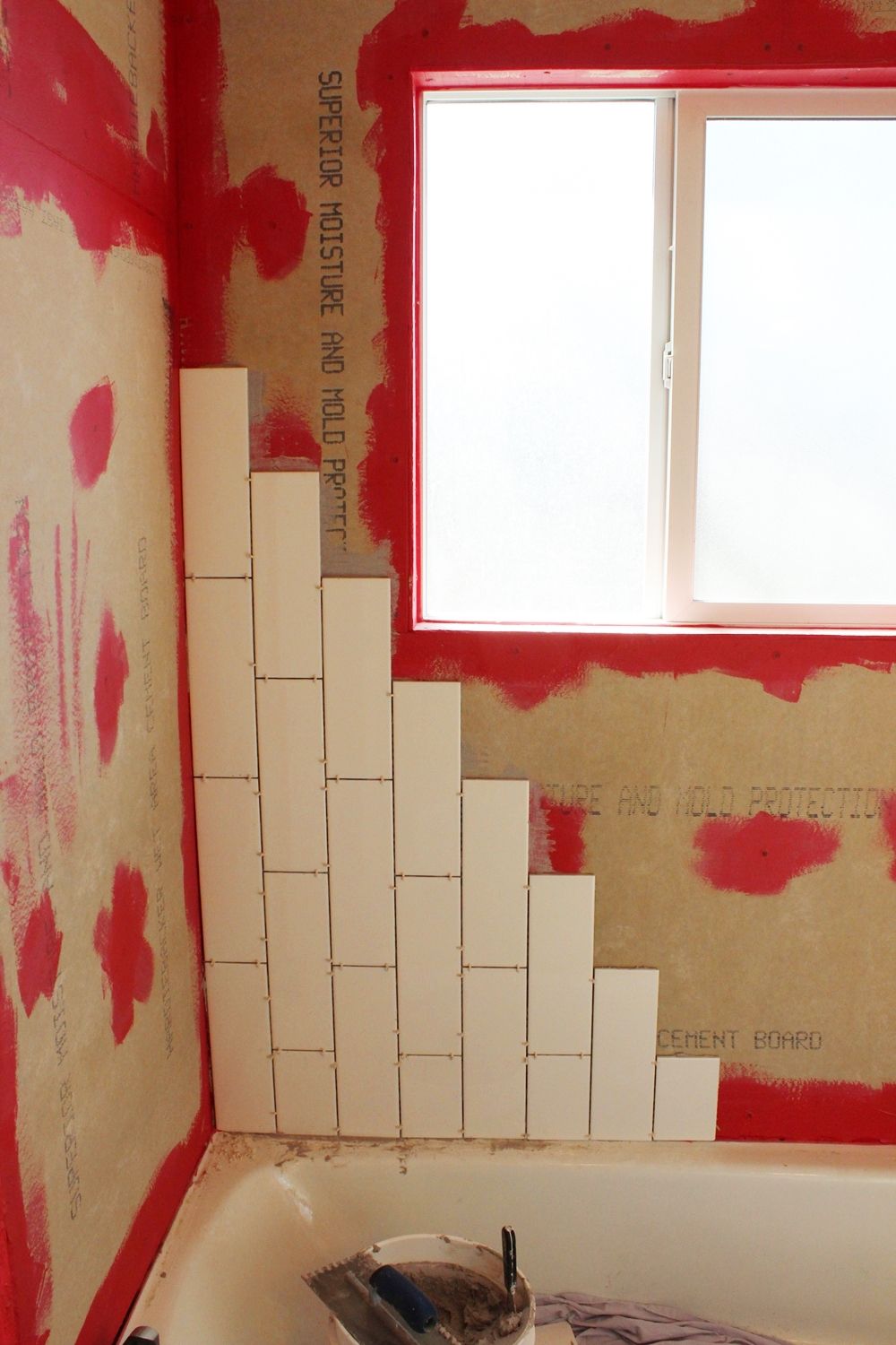 DIY Tile Shower Tub Surround - staircase tiling