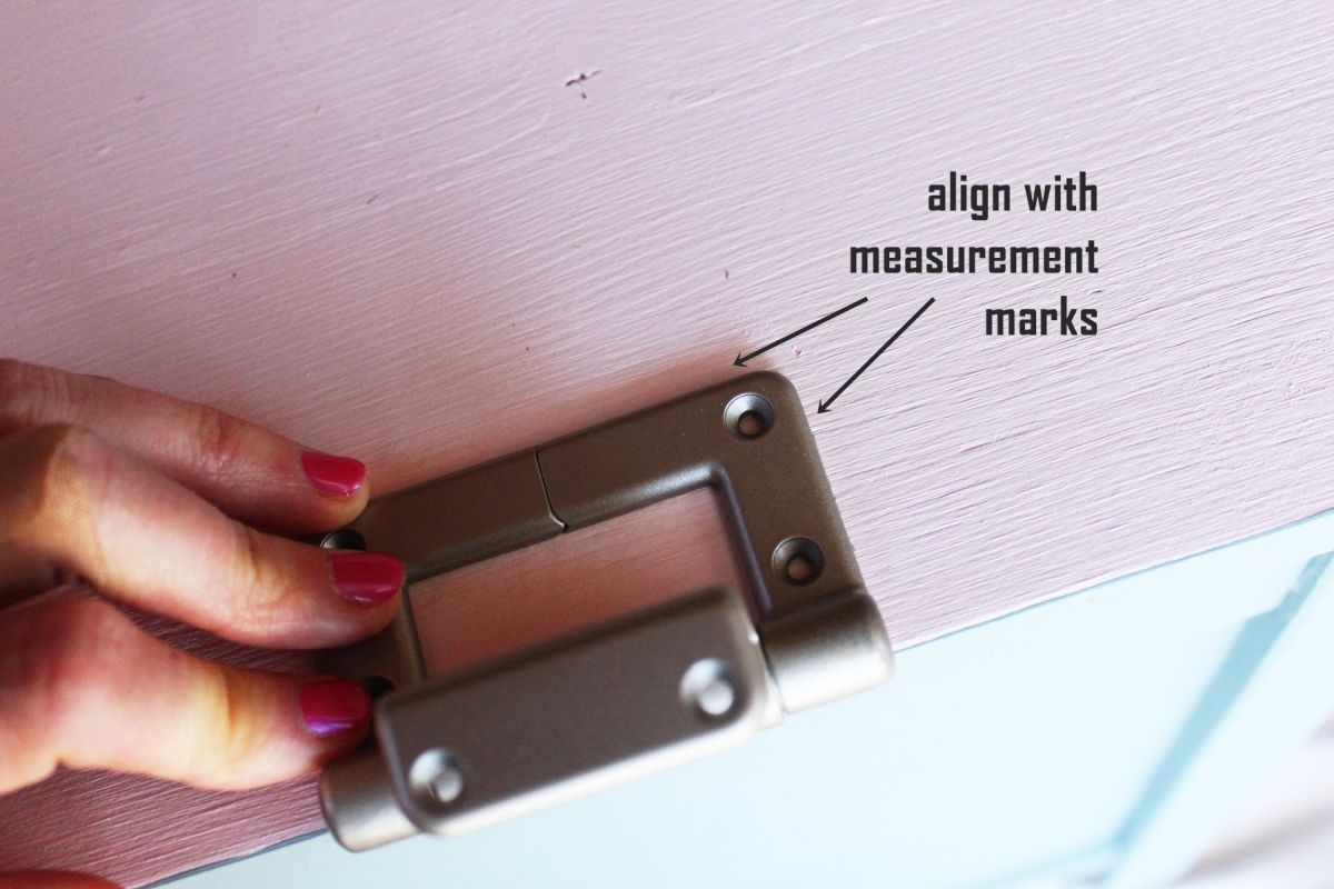 DIY Toy Box Align the outside edge of your hinge with your lines