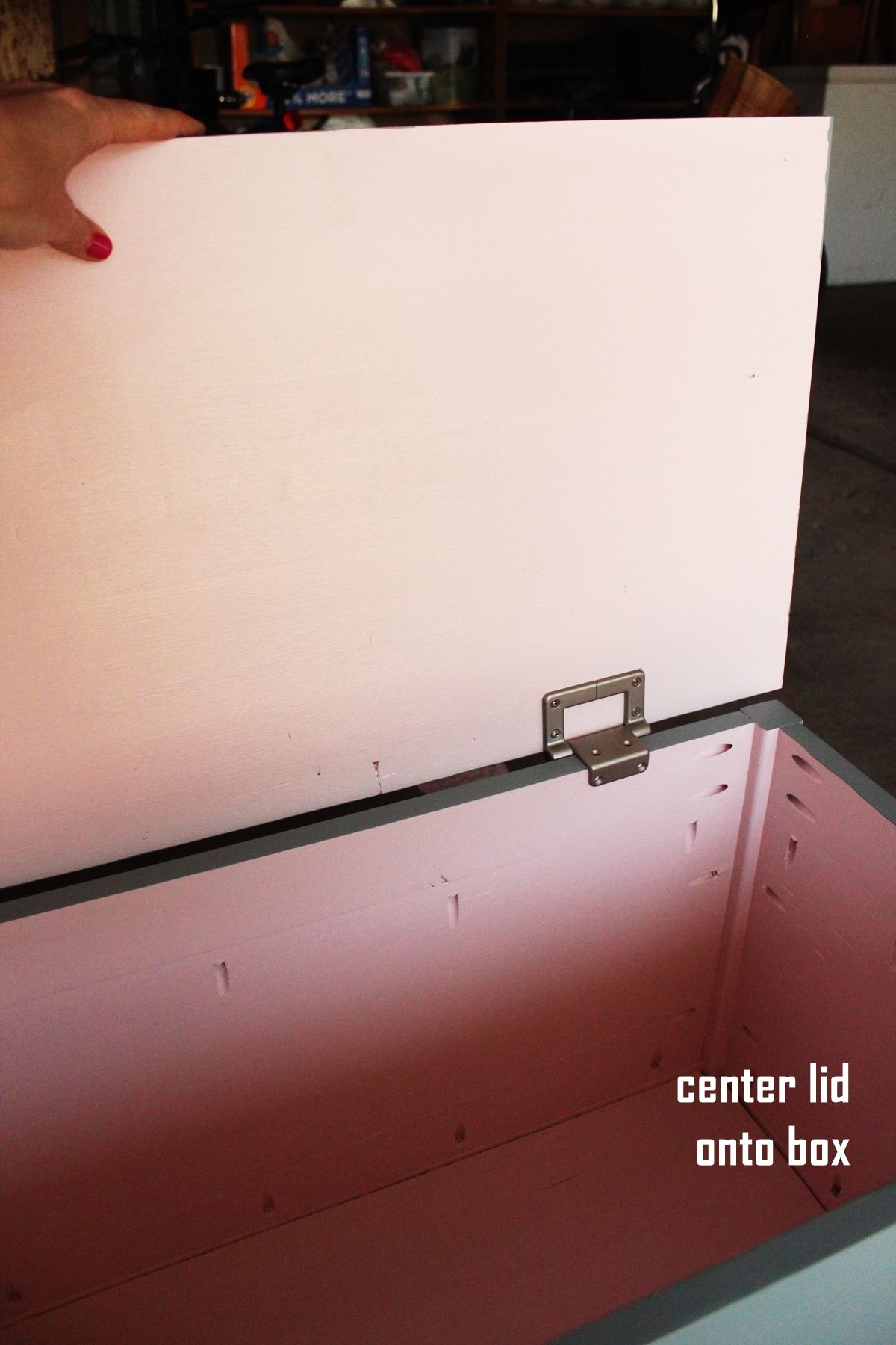 DIY Toy Box slide the hinges onto the back panel