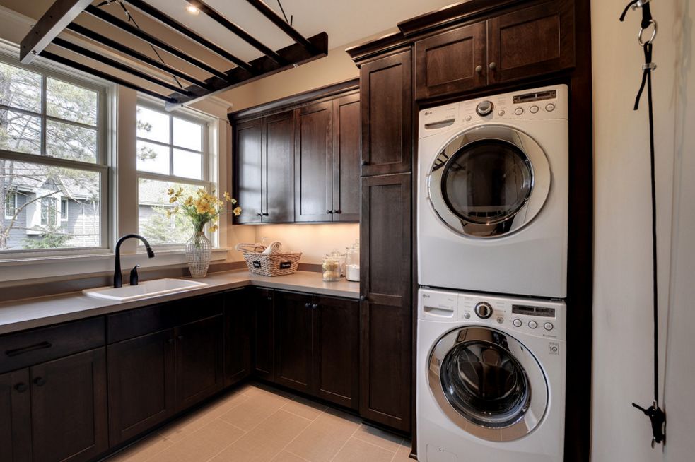 Dark stained wood laundry room