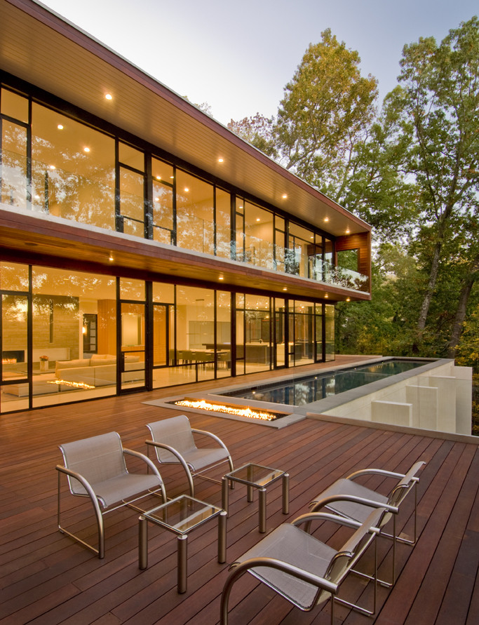 Deck pool and fireplace for a glass house