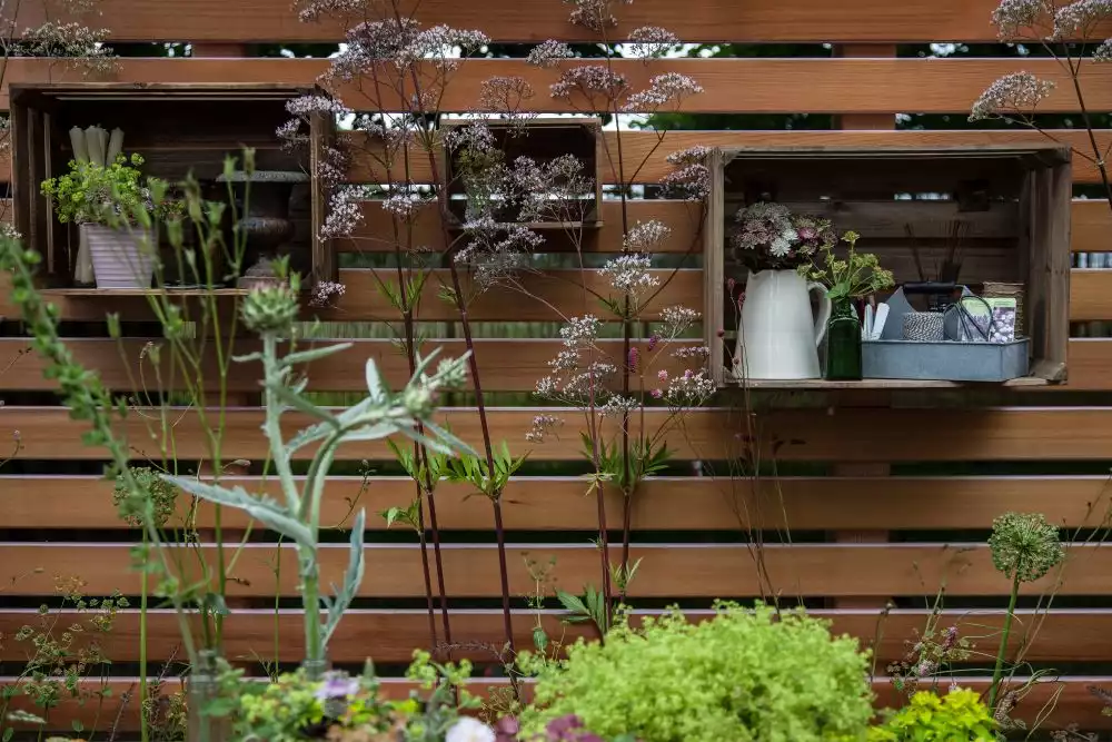 Decorating the fence with crates