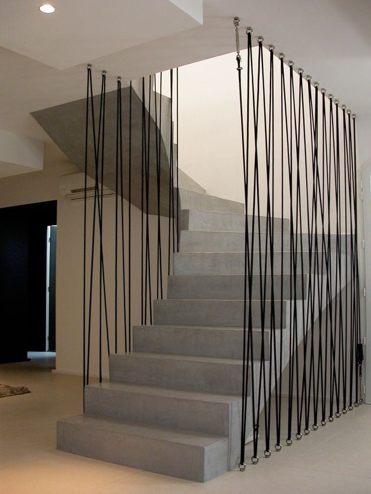 Decorative staircase guard with cords