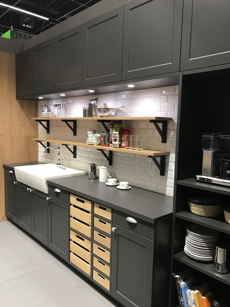 Deep gray kitchen cabinet with subway tiles