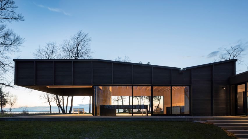 The roof extension looks very natural in the context of the house's architecture and design