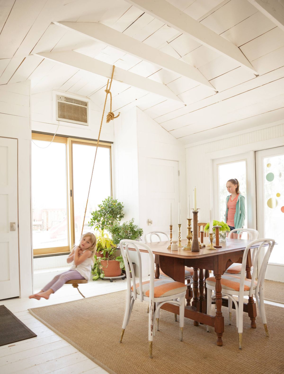 Dining room with a swing