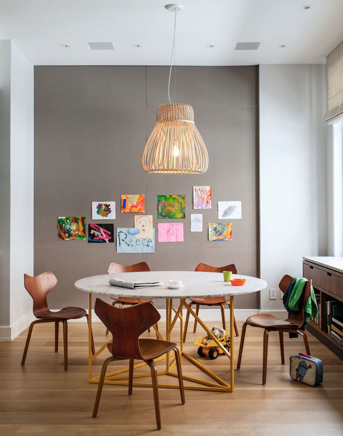 Dining room with open chairs and wall art