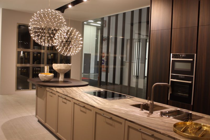 The kitchen island lighting in Doimo's elegant kitchen setting is definitely the focal point of the room. The delicate ball of lights looks like a dandelion gone to seed.