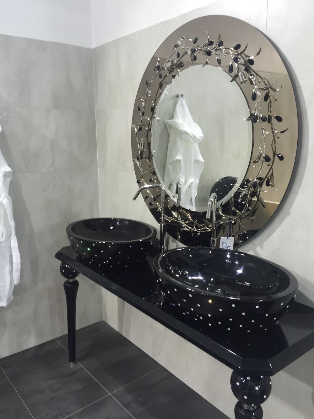 Double black bathroom vanity with round wash basins