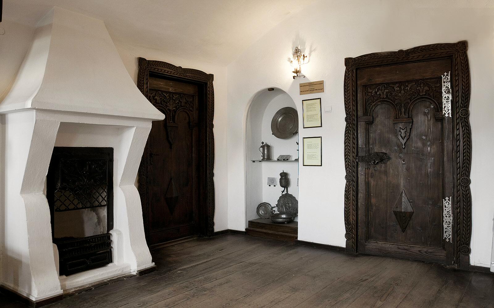 The living quarters are decorated in a more welcoming manner. using a lot of wood