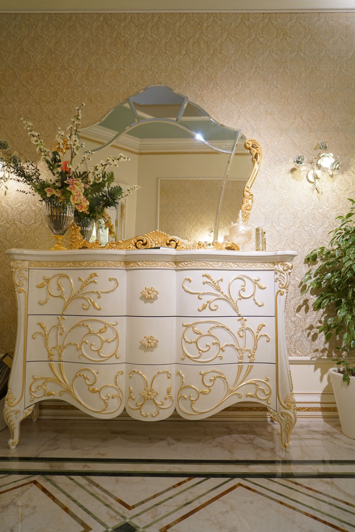 Dressing drawer with gold accents and baroque mirror