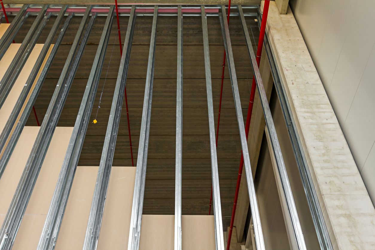 Drywall framing with metal sutds