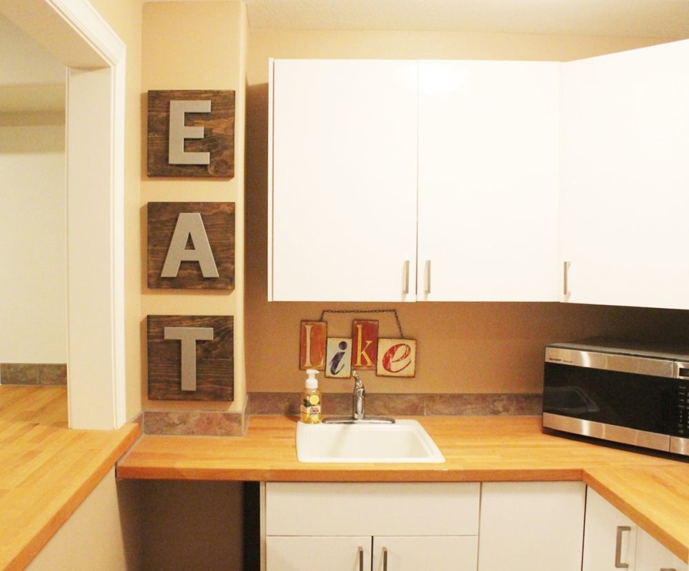 Eat wood sign on kitchen