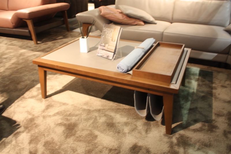 This coffee table from Ego Italiano has just as much function as it does form! The Bergen is a rectangular oak coffee table with a removable tray and a removable leather cover, that extends to create the sling holders for magazines and newspapers.