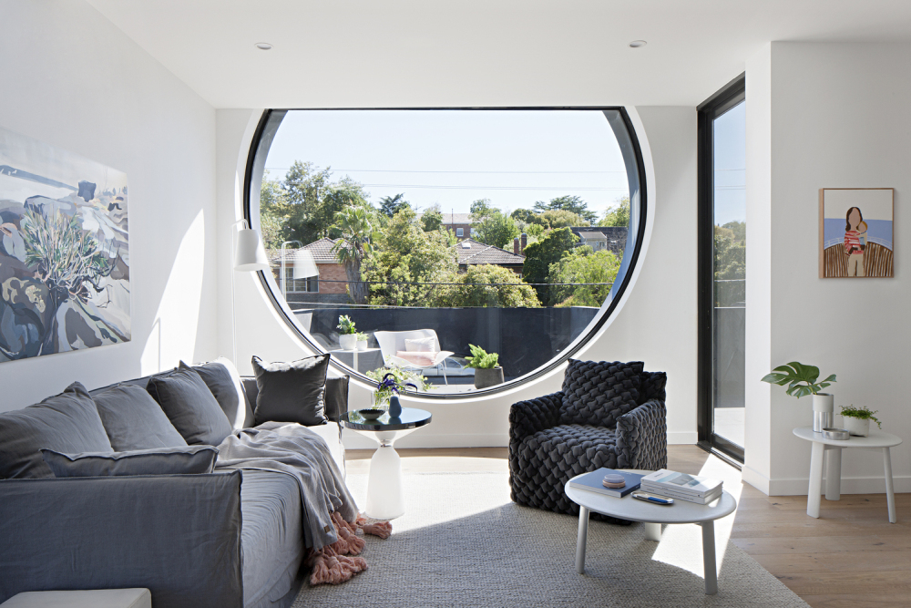 Enormous Glass Portholes Dot This Australian Apartment Building interior