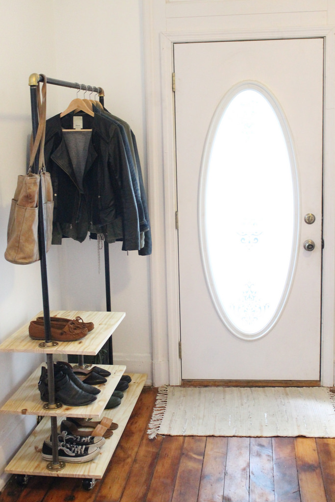 Entryway clothes rack on wheels