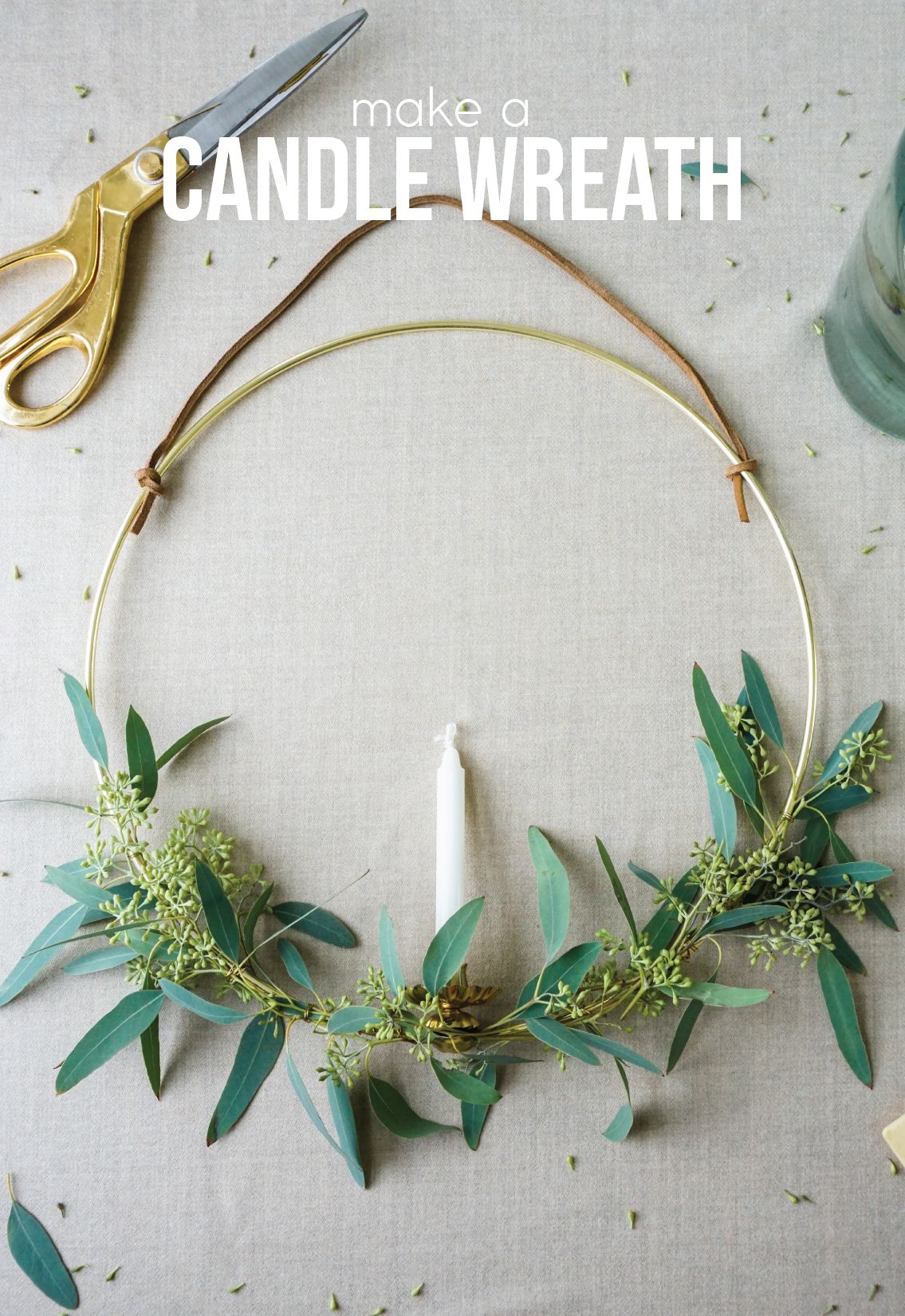 Stylish candle wreath built around a brass ring