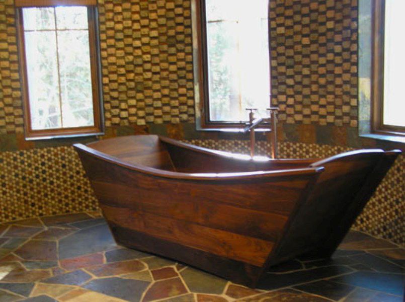 More ship-shaped than the other wooden bathtubs we found, the European-style custom tubs from Bath in Wood of Maine are very interesting and would fit well in a more ornate style of bathroom.